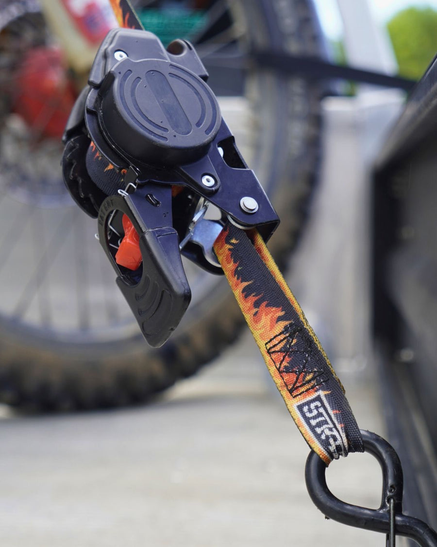 Two Strap Onz Retractable straps in Flames webbing, wound back into their housings